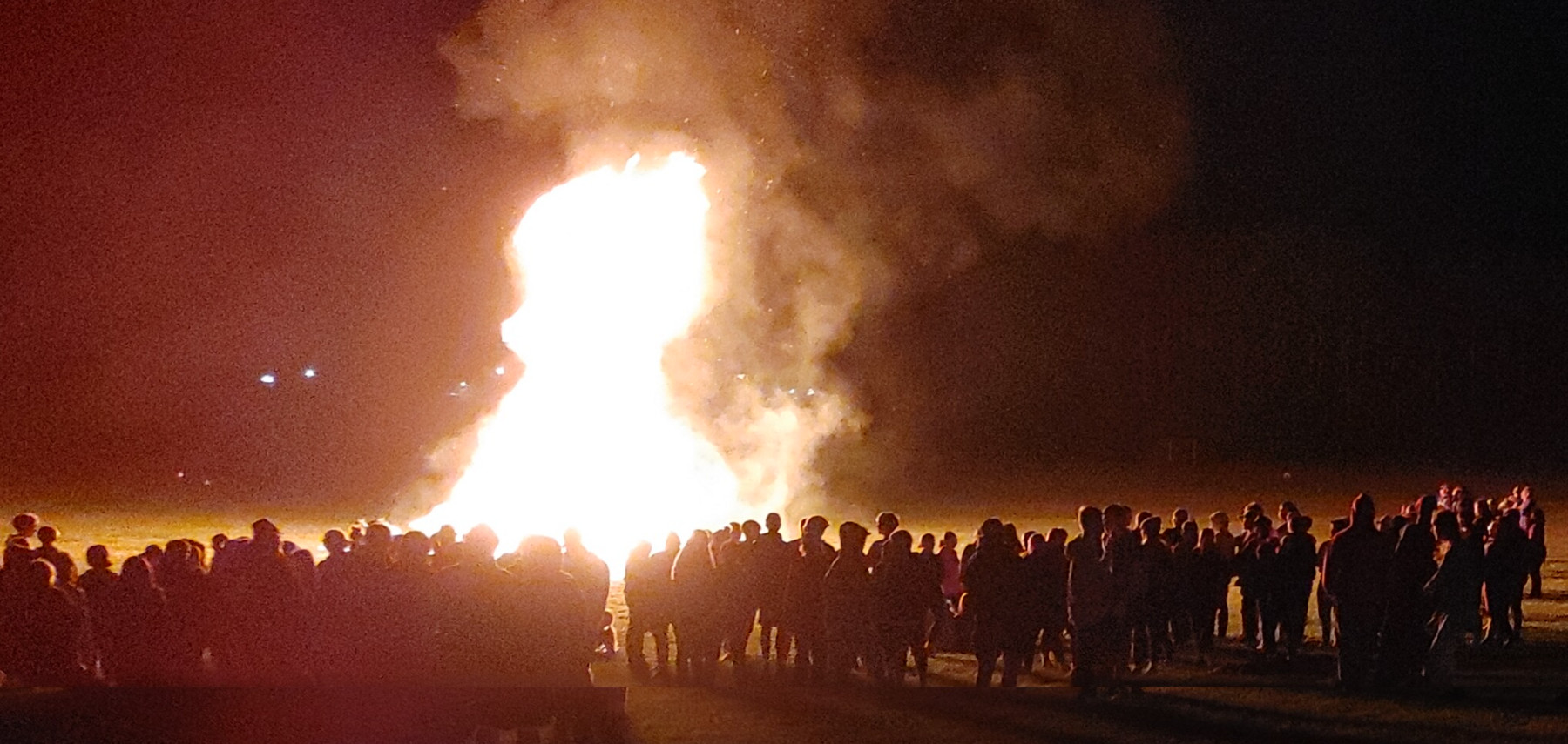 Students around a bonfire