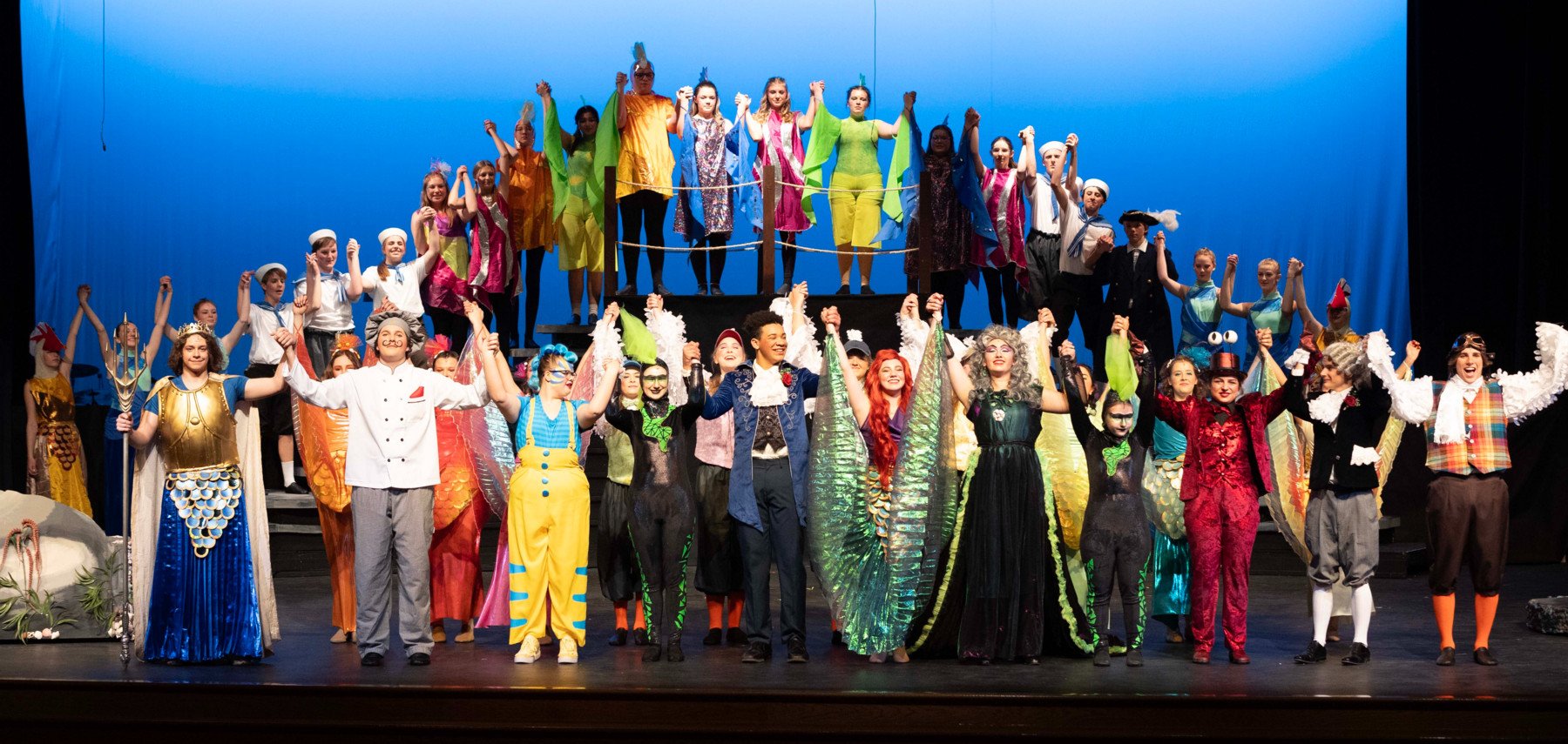 Final curtain after high school performance of Little Mermaid.